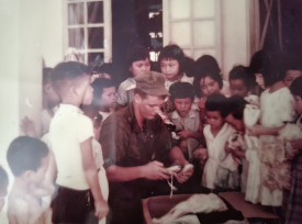 Don Hawkins at one of the orphanages we took clothes and toys to
